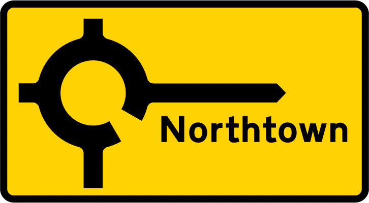 Roundabout ahead leading to a temporary diversion route to the destination shown