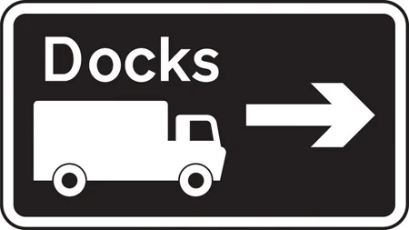 Junction ahead leading to a destination advised for goods vehicles