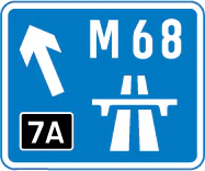 Direction to a motorway at the junction shown, indicating route number