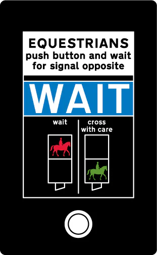Instructions to horse riders above the push button control for an equestrian traffic crossing