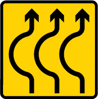 Sharp bends ahead where traffic is diverted onto a temporary road for a short distance