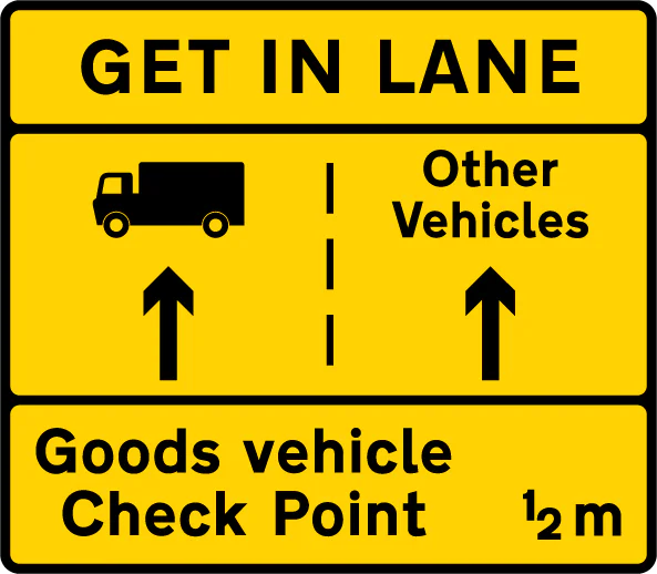Goods vehicles should get into the left lane to attend a goods vehicle check point ahead