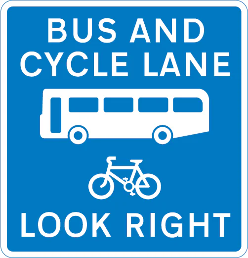 Contra-flow bus lane which pedal cycles may also use with traffic approaching from the right (reminder for pedestrians)
