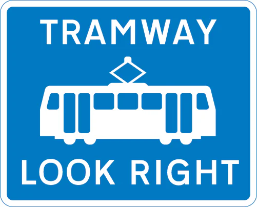 Warning for pedestrians to look out for tramway traffic approaching from the right
